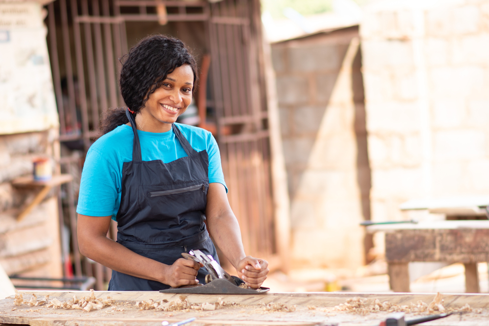 Female African carpenter working