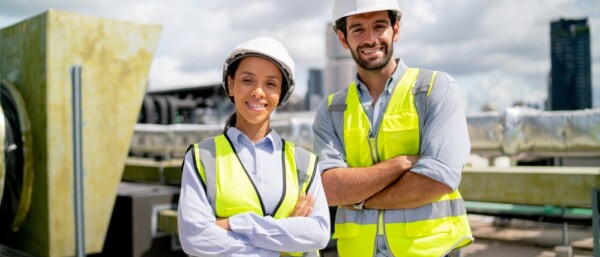 Portrait of two professional engineer or technician workers