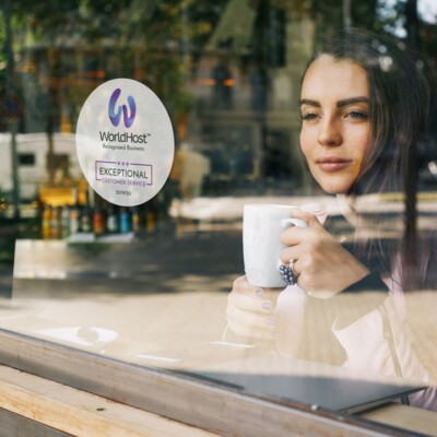 Women sitting in WorldHost recognised cafe